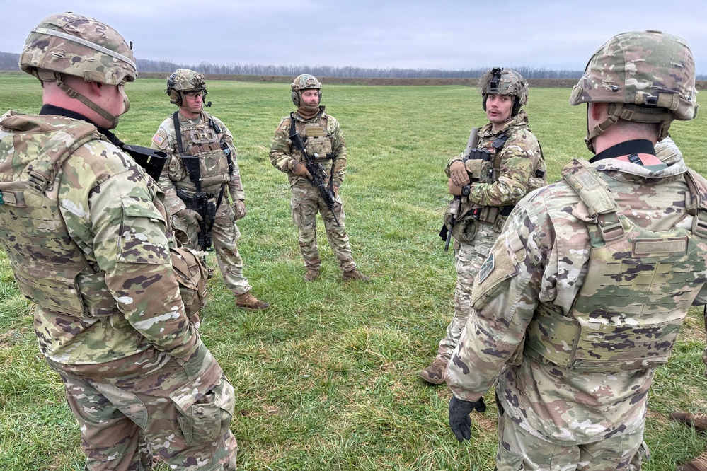 Indiana National Guard soldiers test electronic targets during casualty evacuation training