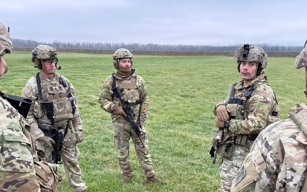 Indiana National Guard soldiers test electronic targets during casualty evacuation training