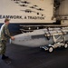 Sailors Move Aircraft Equipment