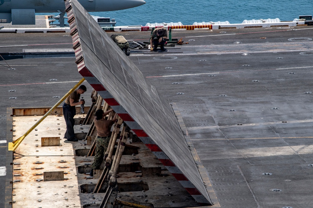 Sailors Conduct Maintenance