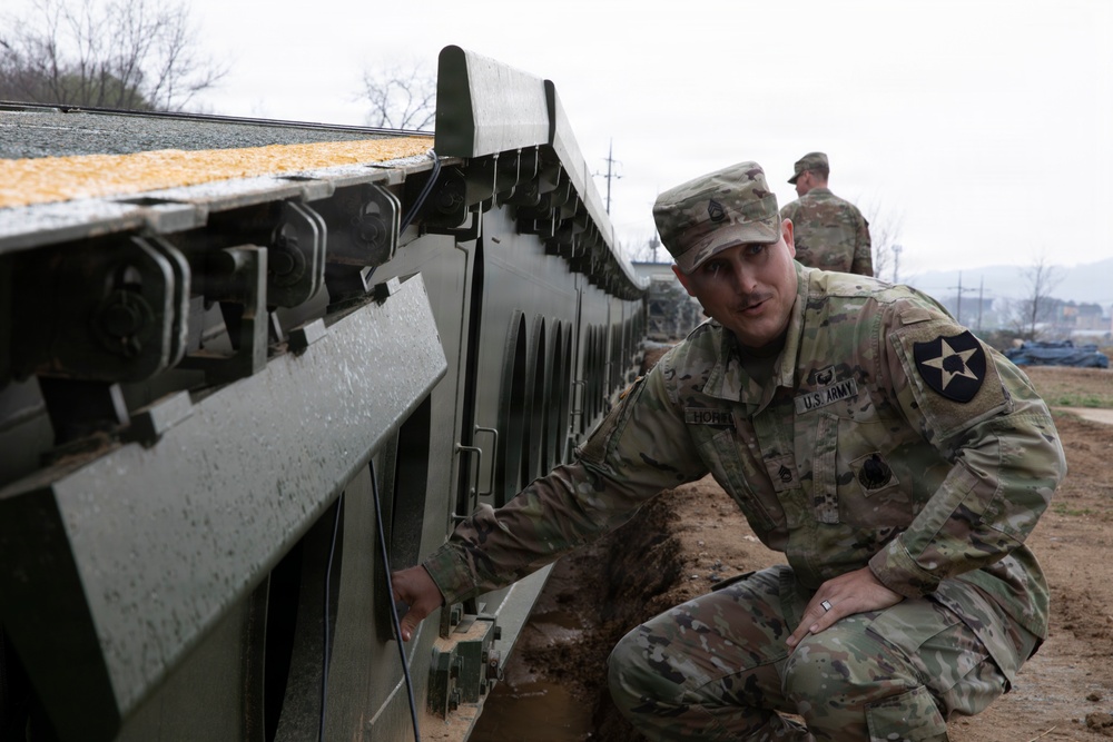 Building toward the future! U.S. and ROK Army Engineer units meet to assess a tactical bridge prototype at Yangpyeong, South Korea