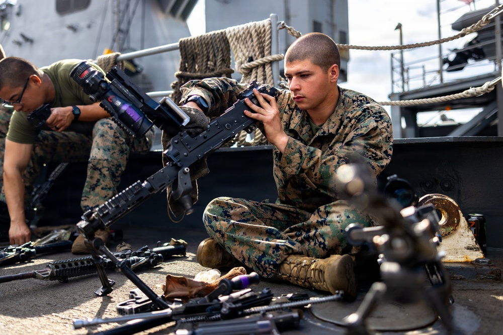 11th MEU Marines, Sailors Conduct Weapons Maintenance Aboard USS Comstock