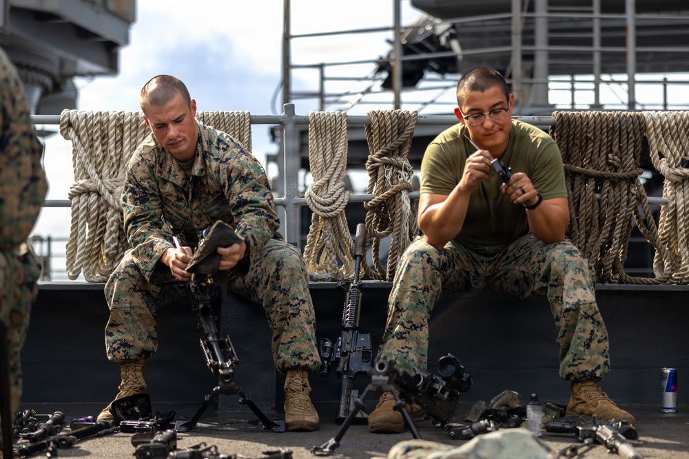 11th MEU Marines, Sailors Conduct Weapons Maintenance Aboard USS Comstock