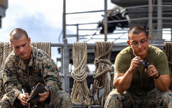11th MEU Marines, Sailors Conduct Weapons Maintenance Aboard USS Comstock
