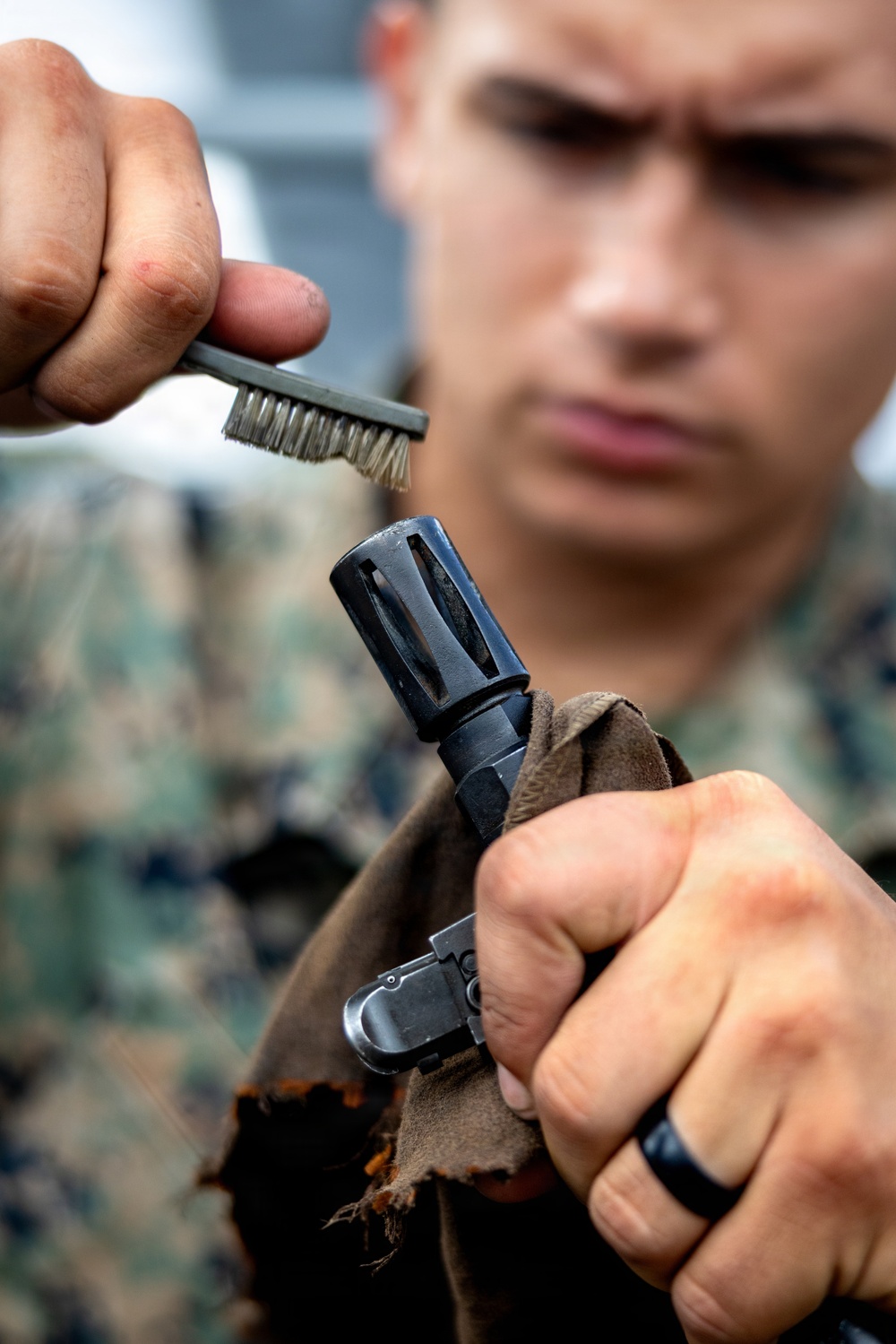 11th MEU Marines, Sailors Conduct Weapons Maintenance Aboard USS Comstock