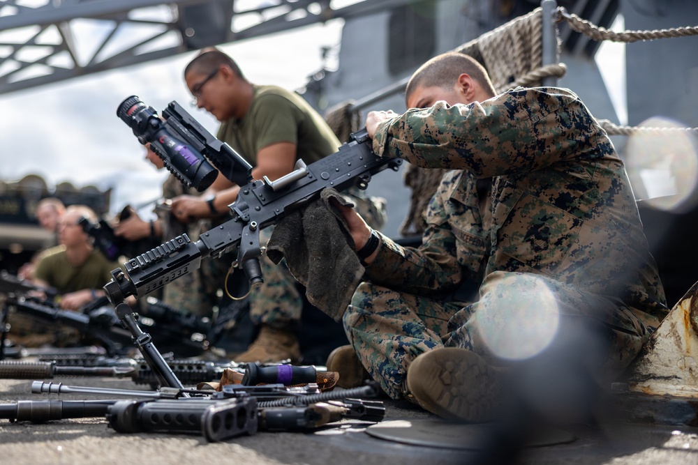 11th MEU Marines, Sailors Conduct Weapons Maintenance Aboard USS Comstock