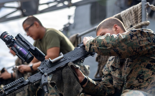 11th MEU Marines, Sailors Conduct Weapons Maintenance Aboard USS Comstock