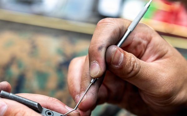 11th MEU Marines, Sailors Conduct Weapons Maintenance Aboard USS Comstock
