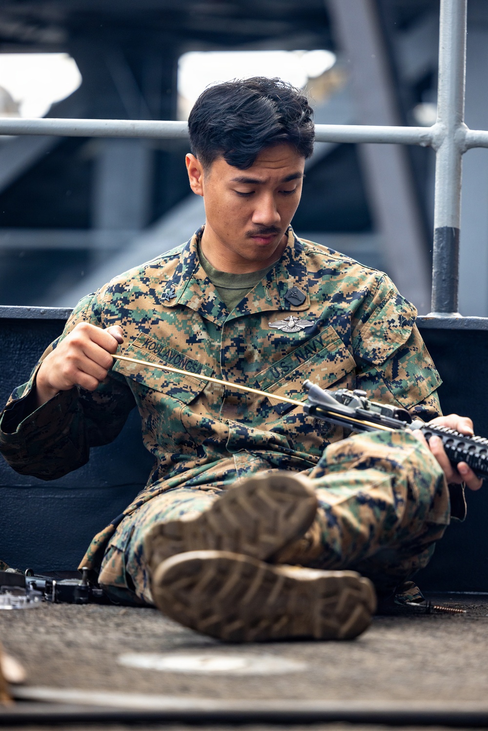 11th MEU Marines, Sailors Conduct Weapons Maintenance Aboard USS Comstock