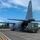346th Air Expeditionary Wing unloads cargo off a C-130J