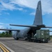 346th Air Expeditionary Wing unloads cargo off a C-130J