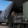 346th Air Expeditionary Wing unloads cargo off a C-130J