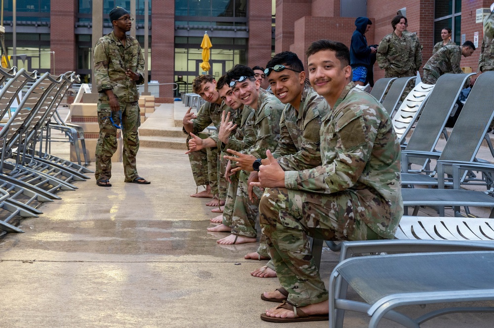 Airmen Swim in Uniform During German Armed Forces Proficiency Badge Assessment