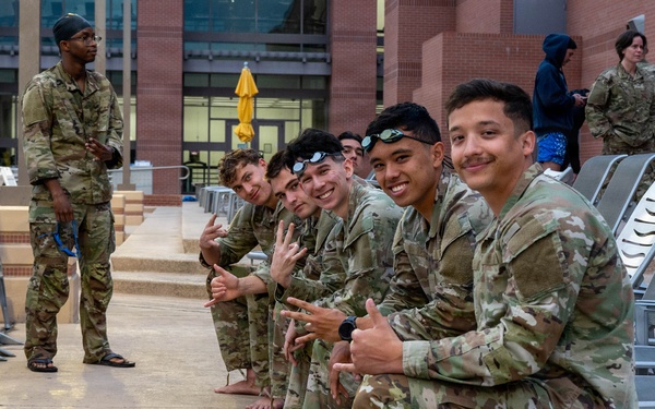 Airmen Swim in Uniform During German Armed Forces Proficiency Badge Assessment