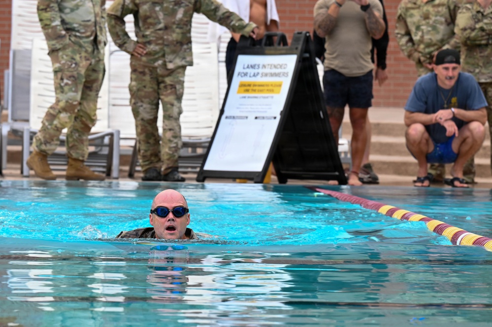 Airmen Swim in Uniform During German Armed Forces Proficiency Badge Assessment