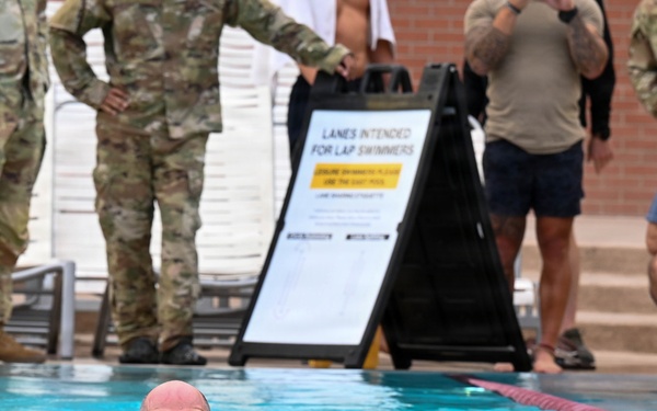 Airmen Swim in Uniform During German Armed Forces Proficiency Badge Assessment