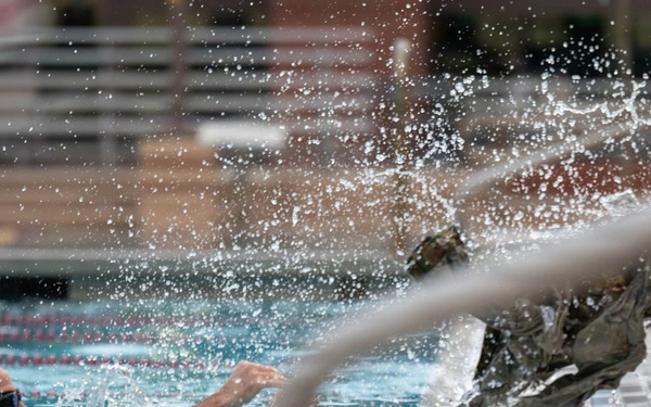 Airmen Swim in Uniform During German Armed Forces Proficiency Badge Assessment