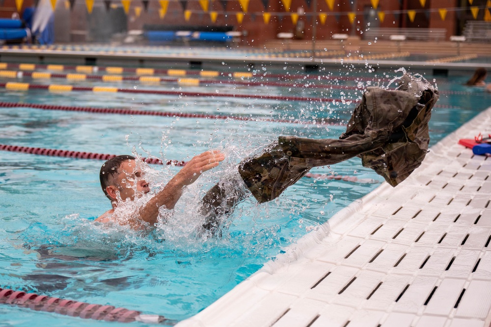 Airmen Swim in Uniform During German Armed Forces Proficiency Badge Assessment