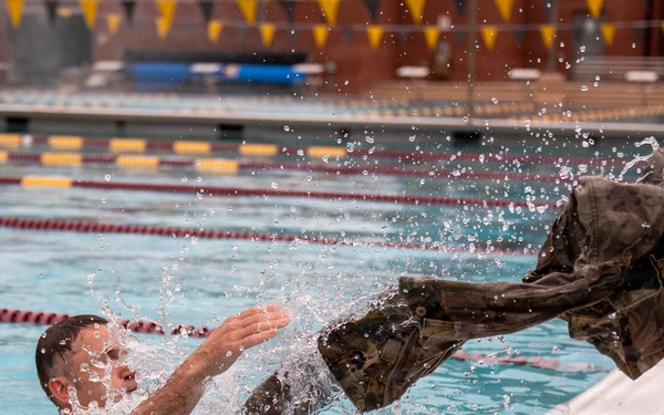 Airmen Swim in Uniform During German Armed Forces Proficiency Badge Assessment