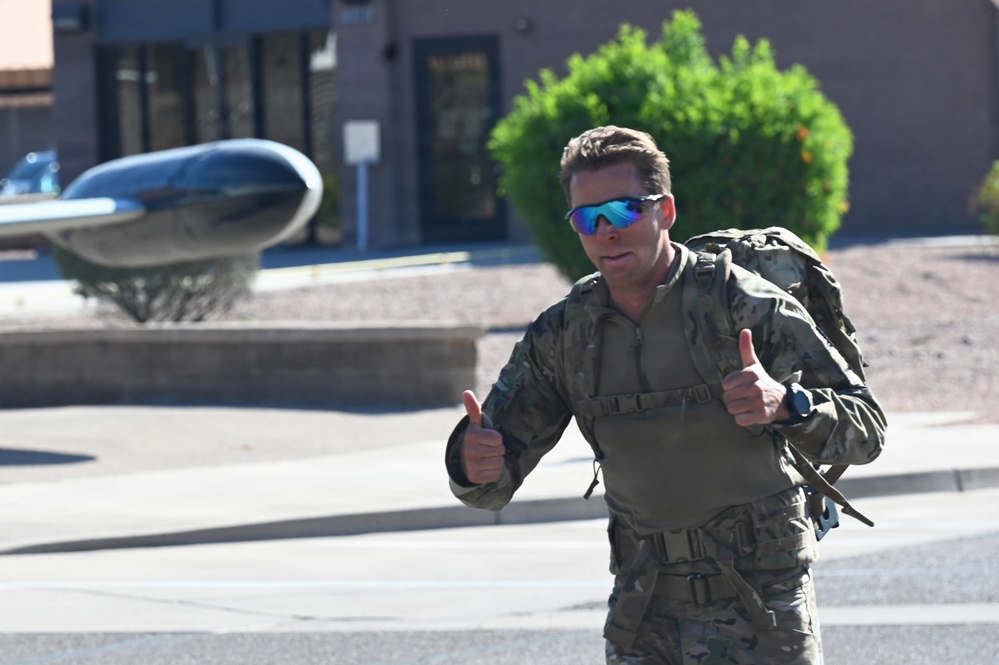 Airmen complete German Armed Forces Proficiency Badge assessment with 33-pound ruck