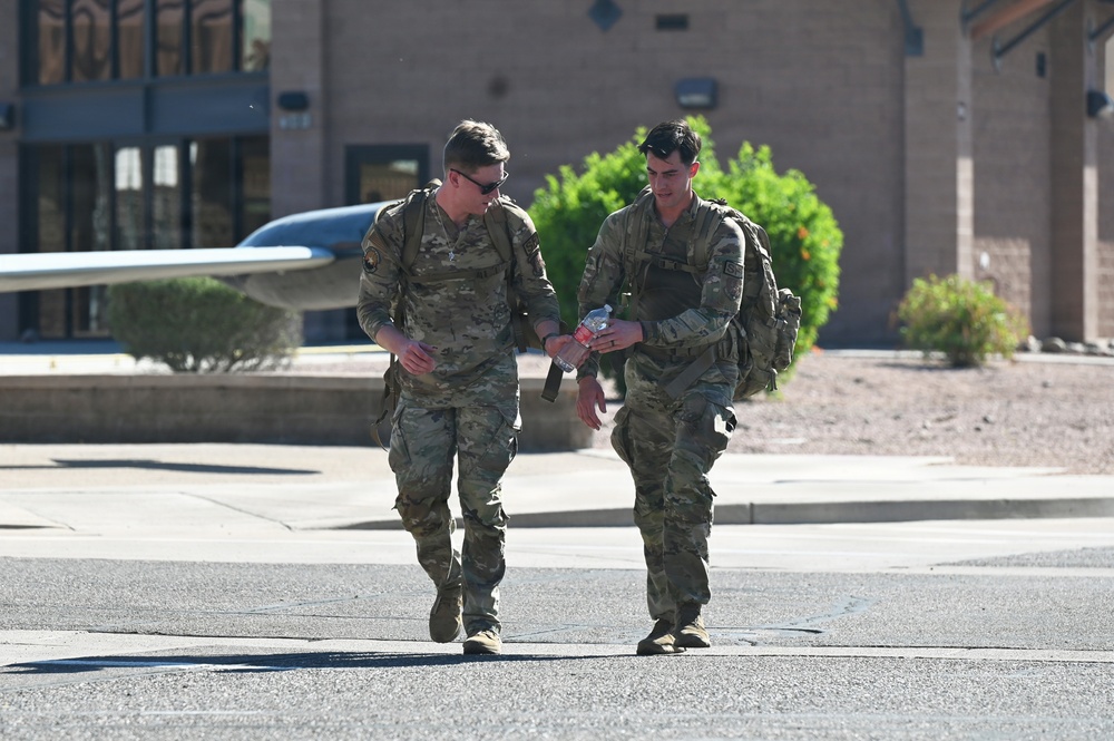 Airmen complete German Armed Forces Proficiency Badge assessment with 33-pound ruck