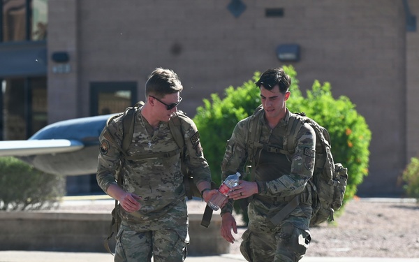 Airmen complete German Armed Forces Proficiency Badge assessment with 33-pound ruck
