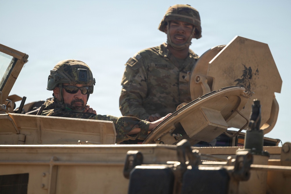 1-12 Cav trade knowledge with NATO partner on M1A2 Abrams