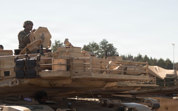 1-12 Cav trade knowledge with NATO partner on M1A2 Abrams