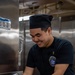 Sailor Works in Galley