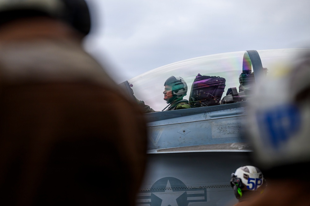 USS Theodore Roosevelt CO Takes Flight