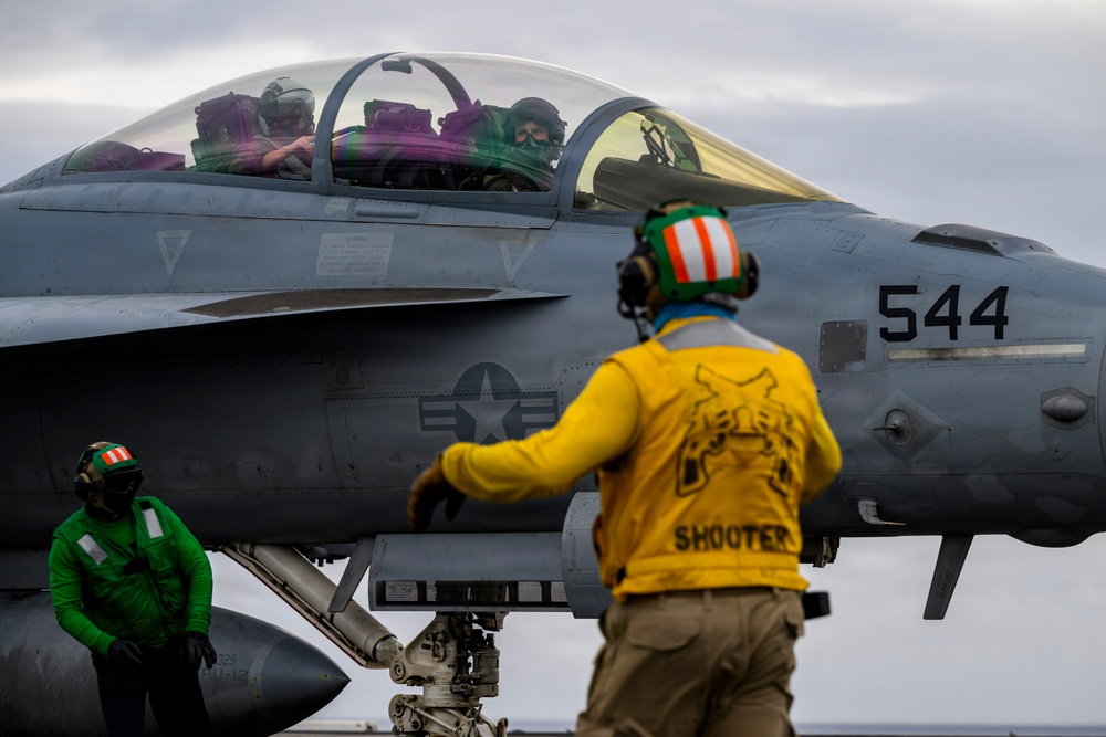 USS Theodore Roosevelt CO Takes Flight