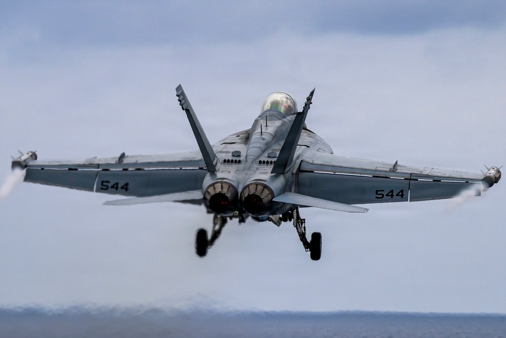USS Theodore Roosevelt CO Takes Flight