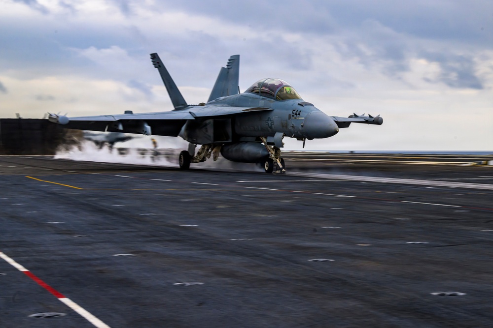 USS Theodore Roosevelt CO Takes Flight