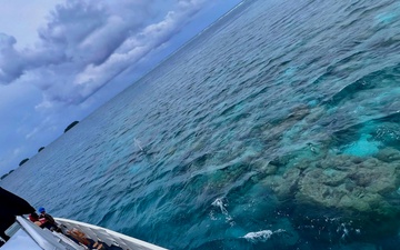 USCGC Oliver Henry (WPC 1140) carefully navigates into Kapingamarangi Atoll lagoon