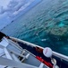 USCGC Oliver Henry (WPC 1140) carefully navigates into Kapingamarangi Atoll lagoon