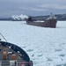 Coast Guard Cutter SPAR (WLB 206) assists motor vessel Lee A. Tregurtha, beset by ice on Lake Superior