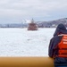 Coast Guard Cutter SPAR (WLB 206) assists motor vessel Lee A. Tregurtha, beset by ice on Lake Superior