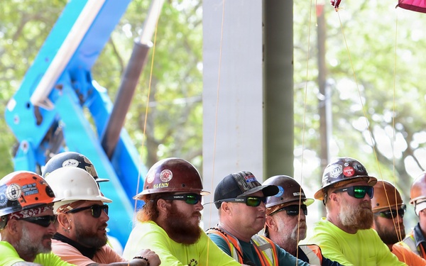 Final steel beam raised on Mississippi Cyber and Technology Center structure
