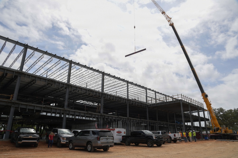 Final steel beam raised on Mississippi Cyber and Technology Center structure