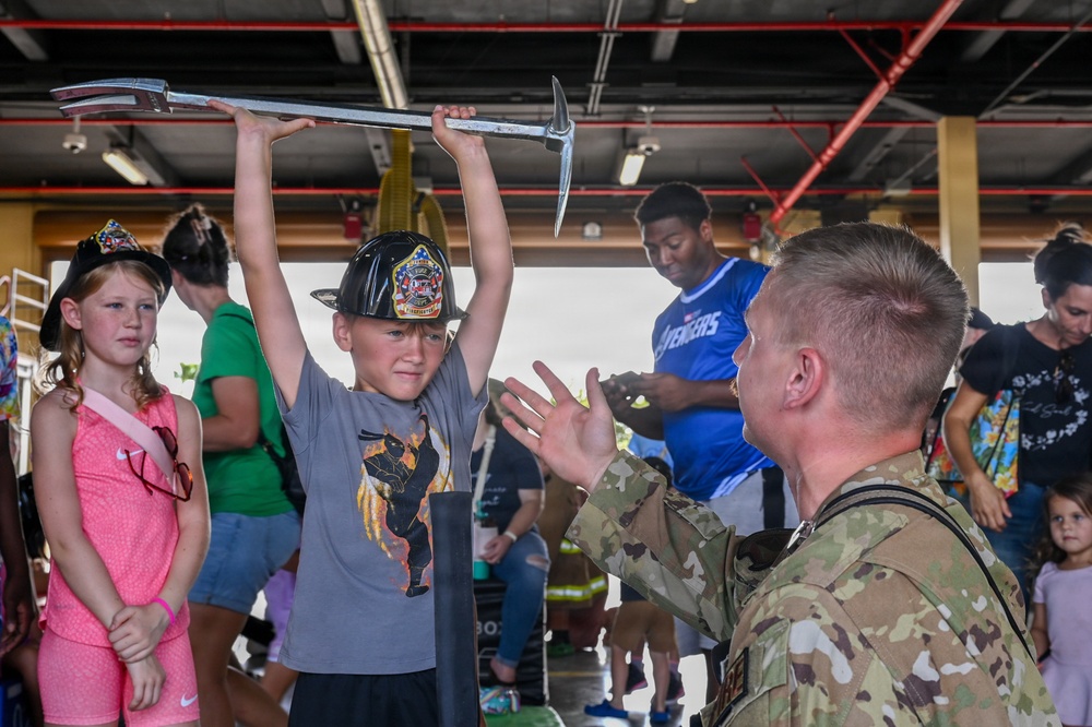 Military home school students tour Andersen AFB