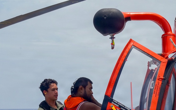 USCGC Midgett prepares to transport survivors to Weno