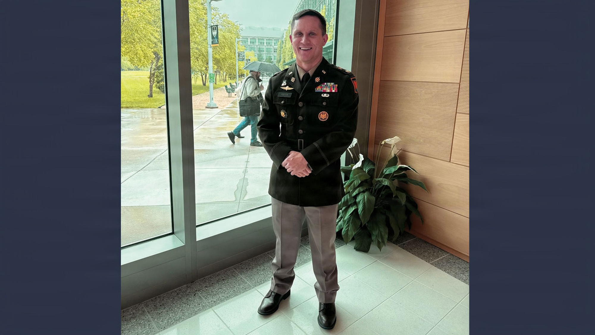 MAJ Chris Foster, Assistant Product Manager for Product Manager Intelligence Systems (PdM IS), smiles after a Change of Responsibility ceremony at the Myer Auditorium on Aberdeen Proving Ground.