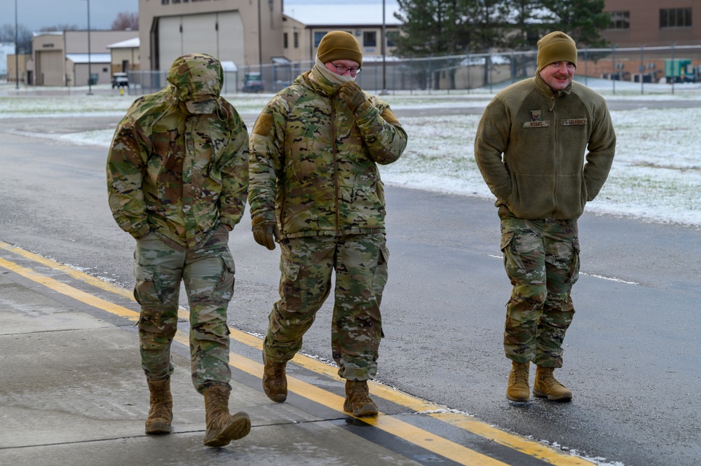 174th Attack Wing Airmen conduct FOD walk in winter conditions