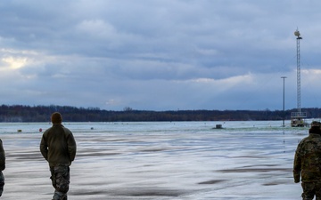 174th Attack Wing Airmen conduct FOD walk in winter conditions