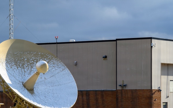 Radar dish covered in snow during FOD walk