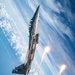 An F-15EX Eagle Releases Flares Over the Gulf Coast