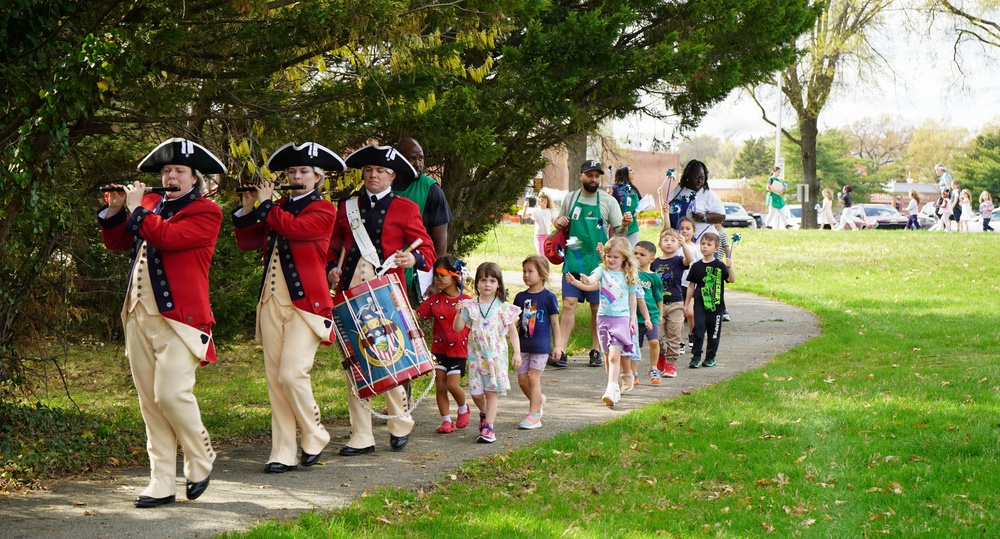 Children marching in the annual Pinwheel Parade
