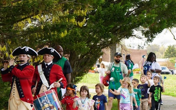 Children marching in the annual Pinwheel Parade