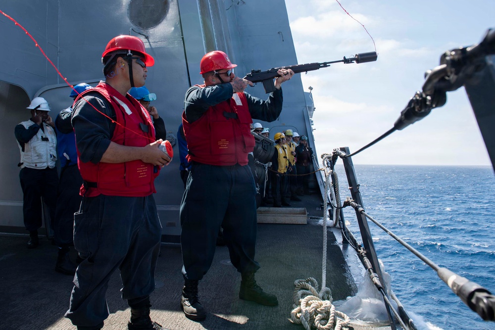 USS John P. Murtha conducts a replenishment-at-sea