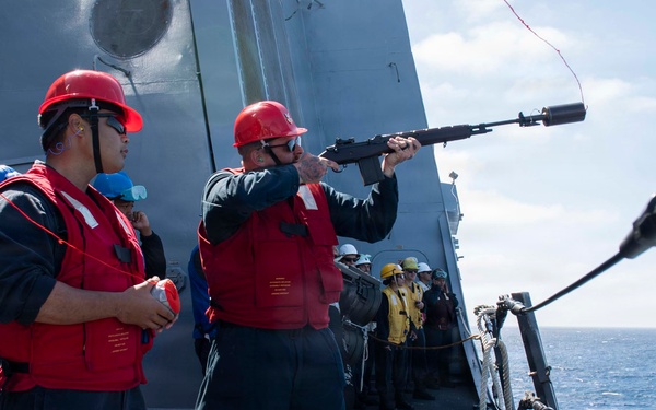 USS John P. Murtha conducts a replenishment-at-sea